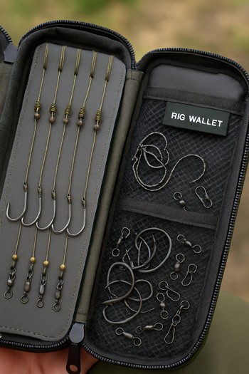 Rig wallet open on a tray with hooklinks pinned in tidy rows